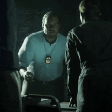 a man with a badge that says ' inspector ' on it