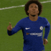 a soccer player with the name willian on his back