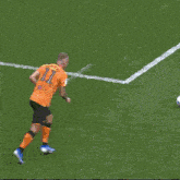 a soccer goalie is diving to block a shot in the net