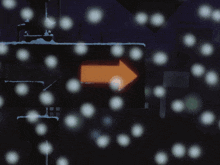 a yellow arrow pointing to the right is lit up at night