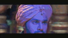 a pixelated image of a man with a turban