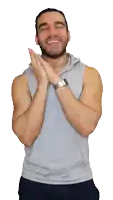 a man with a beard wearing a grey tank top and a silver watch