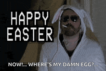 a man wearing bunny ears and sunglasses says happy easter