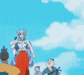 a cartoon character with horns is standing next to a man holding a sword .
