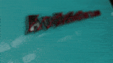 a blurred image of the word bliss on a blue surface