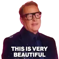 a man in a suit and tie says this is very beautiful