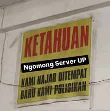 a sign that says ketahun ngamong server up on it