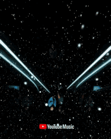 a person is flying through a tunnel with a youtube music logo on the bottom