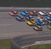 a blurred image of a race car going down a track
