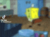 a blurry picture of a spongebob squarepants scene with tiktok written on the bottom