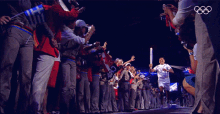 Olympic Fire Olympic Torch Relay GIF - Olympic Fire Olympic Torch Relay Runner GIFs