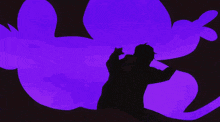 a cartoon character with yellow eyes is covering his face