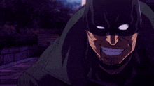 a close up of a man wearing a black mask