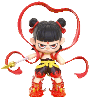 a figurine of a cartoon character with red ribbons around his head