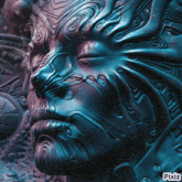 a blue and purple sculpture of a face with pixiz written on the bottom