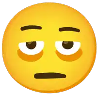 a yellow smiley face with black eyebrows and a serious look on his face
