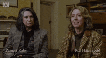 two women named pamela rabe and roz hammond are sitting next to each other in a room