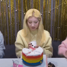 kim lip loona on her birthday looking at her cup sad desolate sniffing almost crying lgbt cake