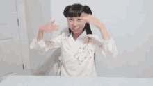 Yumi King Hair Buns GIF