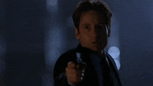 What The Hell Are You Talking About The Xfiles GIF - What The Hell Are You Talking About The Xfiles Mulder GIFs