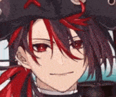 a close up of a person 's face with red hair and a hat .