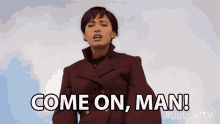 a woman in a maroon coat is saying " come on man "