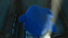 a sonic the hedgehog with a flashlight on his head