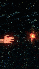 a fist is being thrown through a hole in space