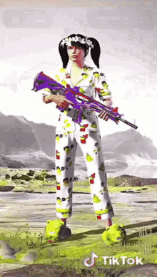 a tiktok video of a girl holding a gun in a field
