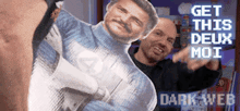 two men standing next to a cardboard cutout of a man with the words get this deux moi dark web written on the bottom