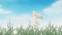 a girl in a white dress stands in a grassy field