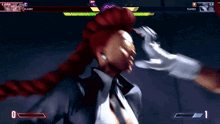 a video game screen shows a woman with red hair