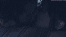 a close up of a man and woman kissing with the words lowkeyssebastian.tumblr at the top