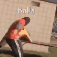 a blurred image with the word balls in white
