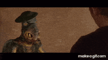 a make a gif.com website shows a man and a monster