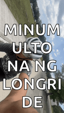 a picture of a person wearing a helmet with the words " minum ulto nang longri de " below it