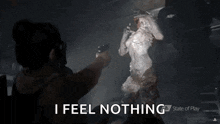 a video game character is holding a gun in front of a monster and saying `` i feel nothing '' .