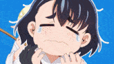 a cartoon of a girl with a tear running down her cheek