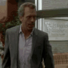 House Wink GIF - House Wink GIFs
