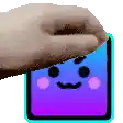 a hand is holding a purple and blue cube with a smiling face .