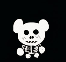 a teddy bear with a skeleton face and arms