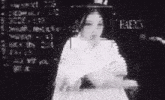a black and white image of a woman with the words " haerx " on the bottom right