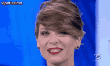 a close up of a woman 's face with the words viperissima on the top