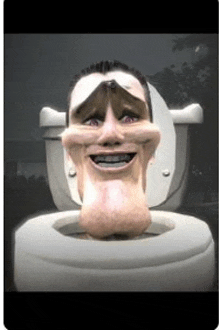 a man is sitting in a toilet with his head sticking out of it .