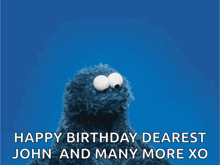 elmo from sesame street is holding a red heart and wishing john and many more xo .