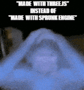 a man is covered in a blue blanket with the words made with three is instead of made with sprunk engine