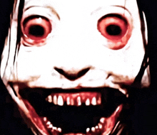 a close up of a person 's face with bloody eyes and teeth