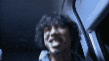 a blurry picture of a man with the letter d visible