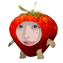 a strawberry with a face cut out of it