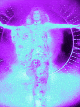 a woman in a blue dress is standing in front of a purple light